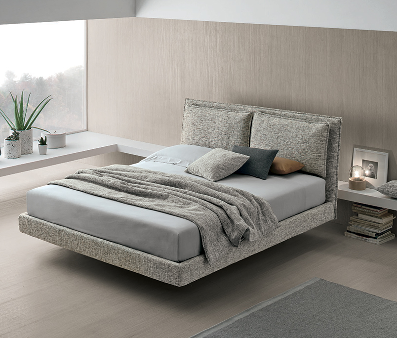 Letto una piazza e mezza con testata design Nuvola